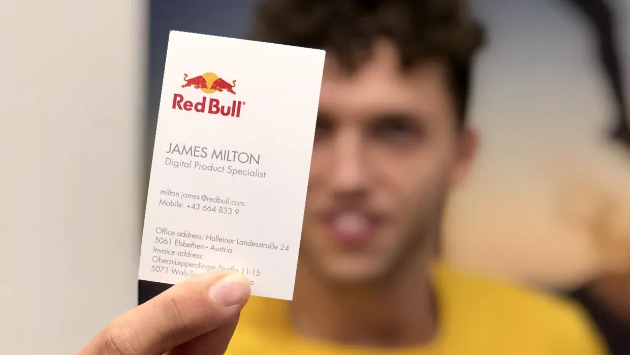 James Milton holding his Red Bull Digital Product Specialist business card